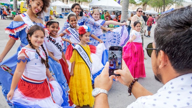 Beauty pageant contestants at the Junta Hispana Hispanic cultural festival in Miami.
