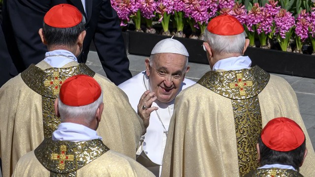 Pope Francis greets cardinals during the 2023 Easter Mass at St. Peter's Square in Vatican City. (Antonio Masiello/Getty Images)